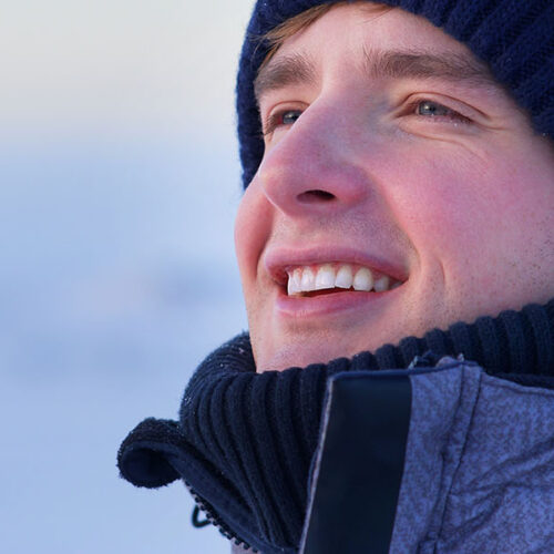 Smiling man in winter hat