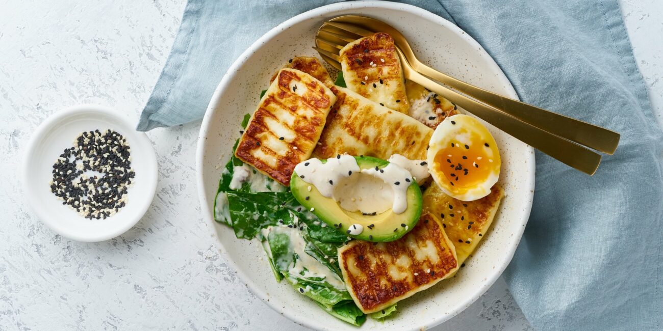 soft boiled eggs with grilled haloumi, avocado and lettuce