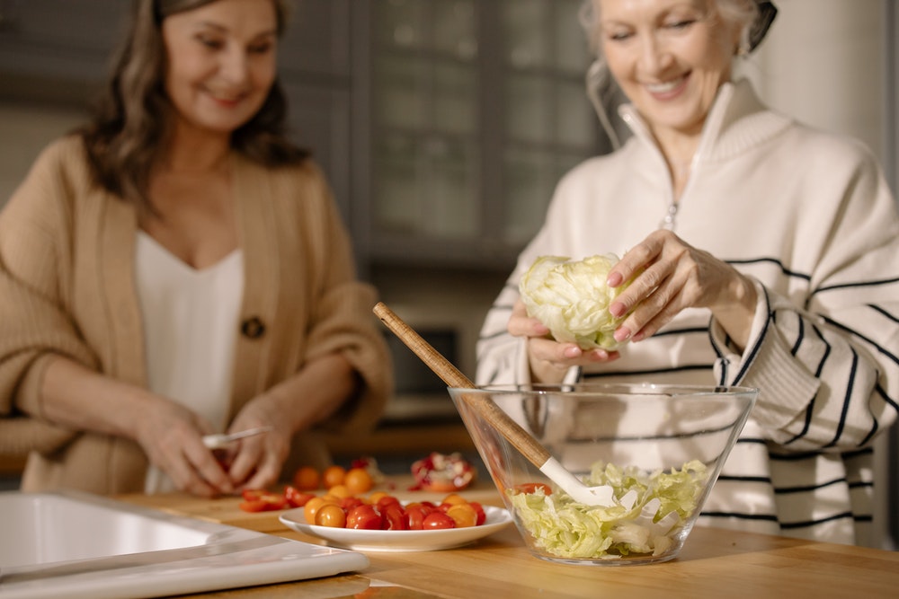 Women making salad