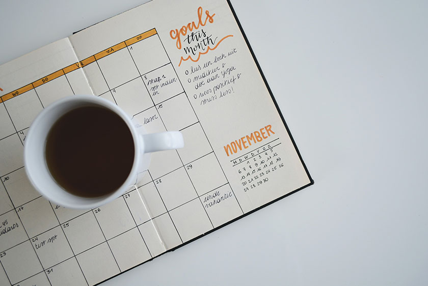 Coffee cup on a calendar