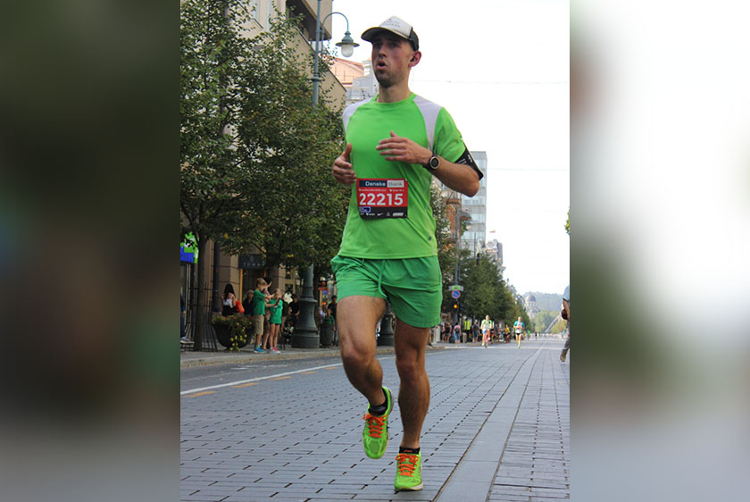 Runner in green outfit
