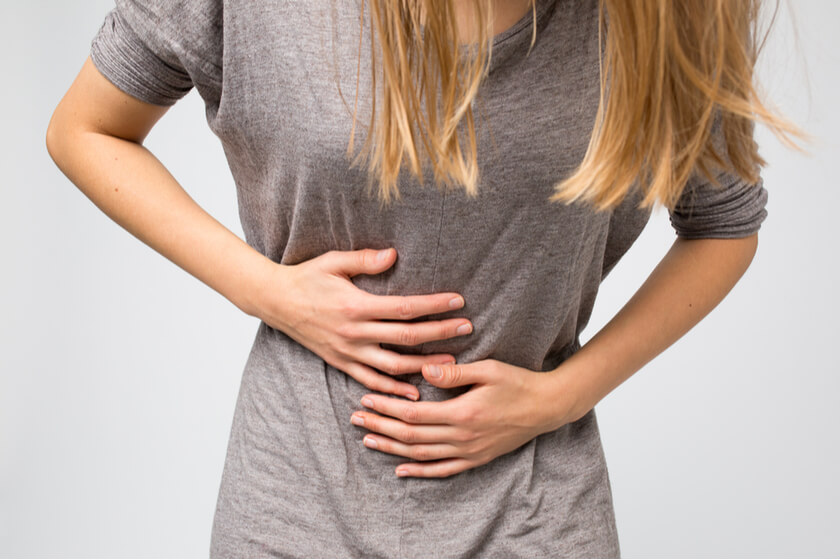 woman has a stomach pain