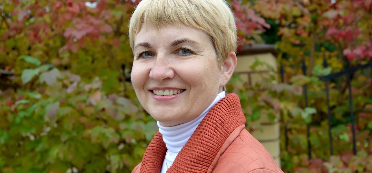 Smiling short haired middle aged woman