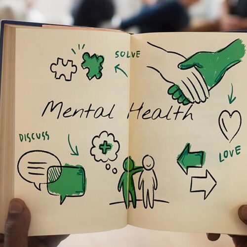 hands holding mental health illustration in a session