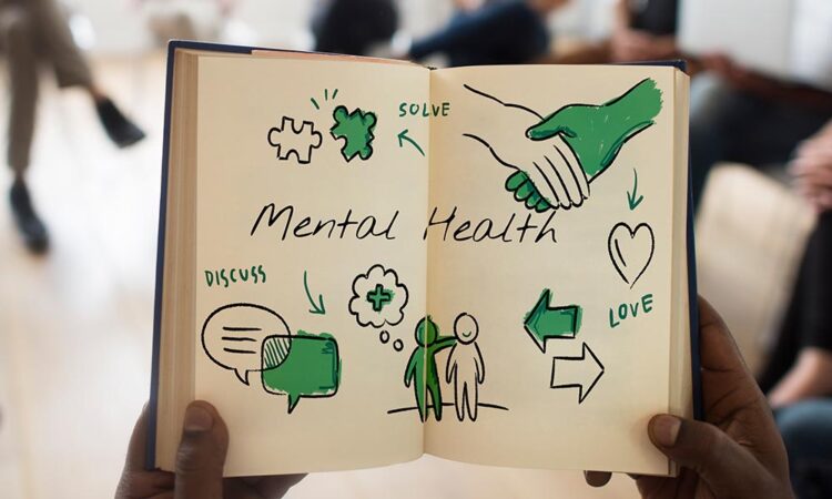 hands holding mental health illustration in a session