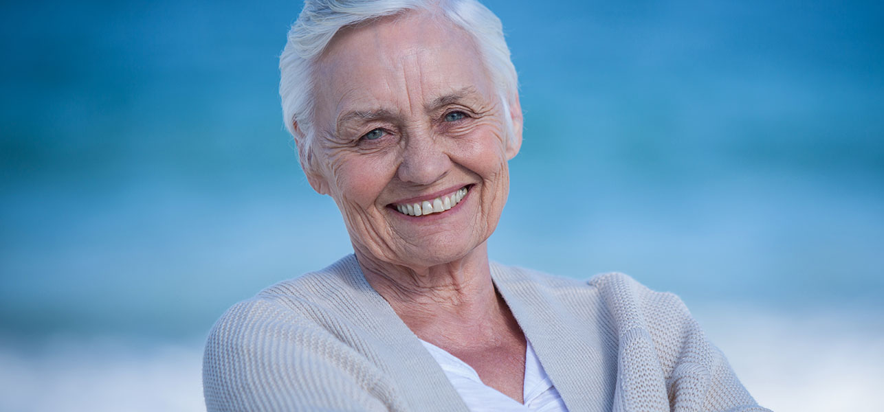 Older age woman in short white hair