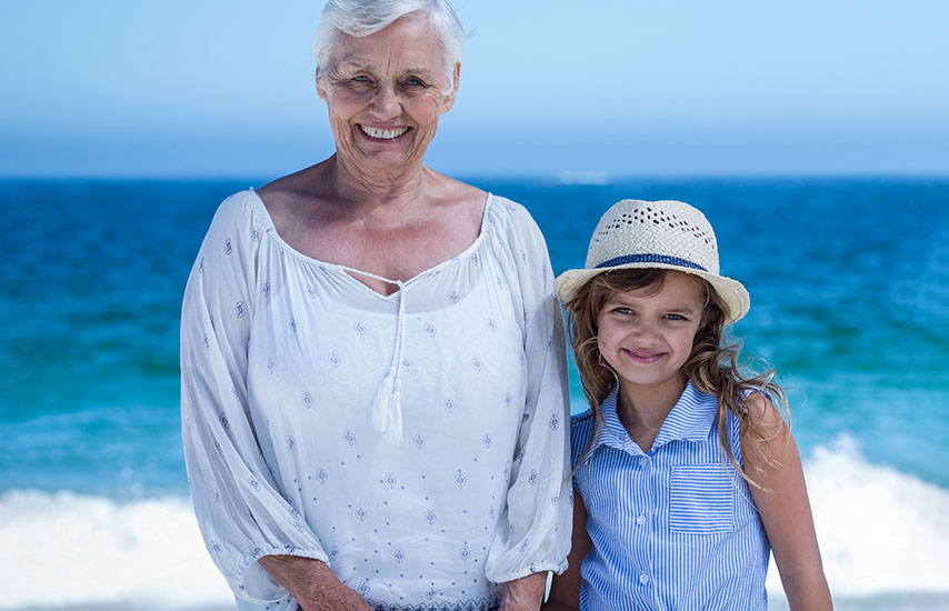 Older woman posing with little girl